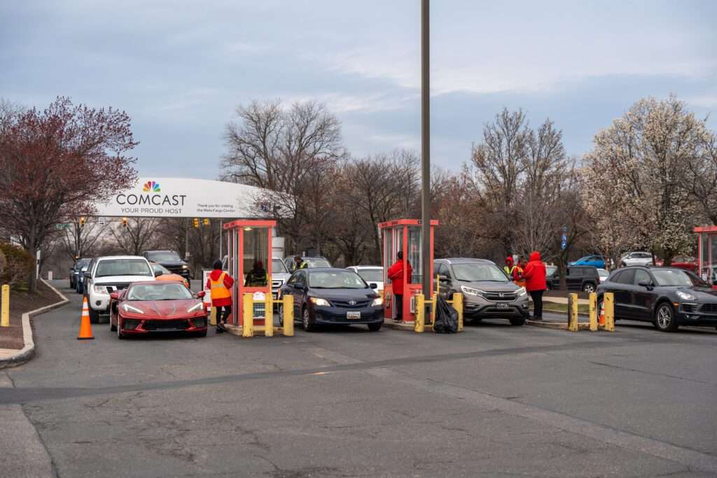 SP+ Comcast parking event - cars coming into outdoor parking lot