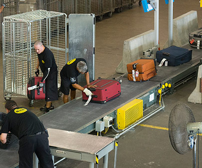 BAGS employees gathering luggage