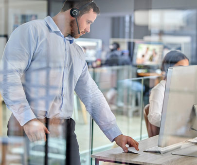 Man working around computers